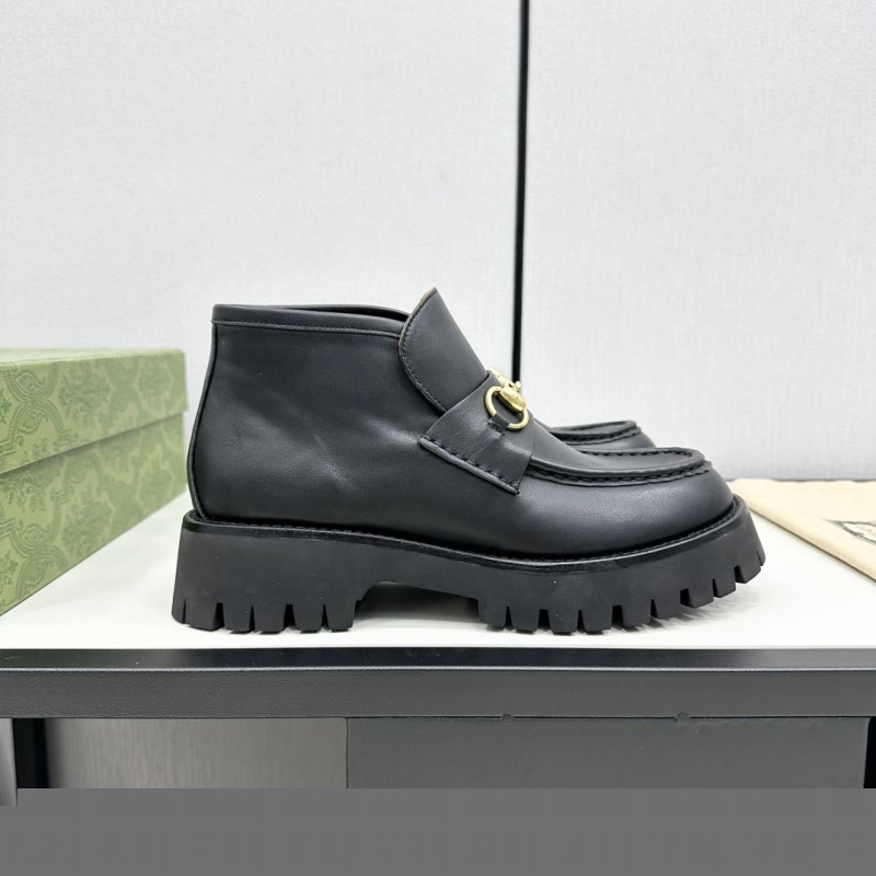 G*u*i boots